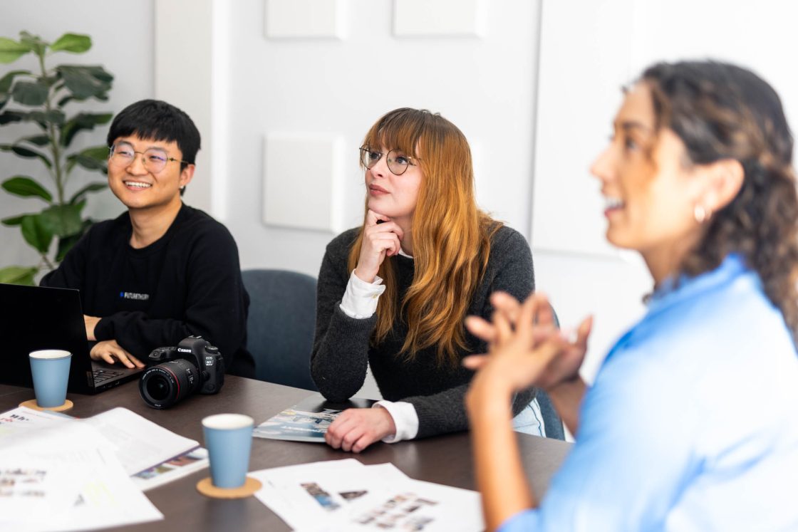 3 of team members in a meeting at our Canberra office.