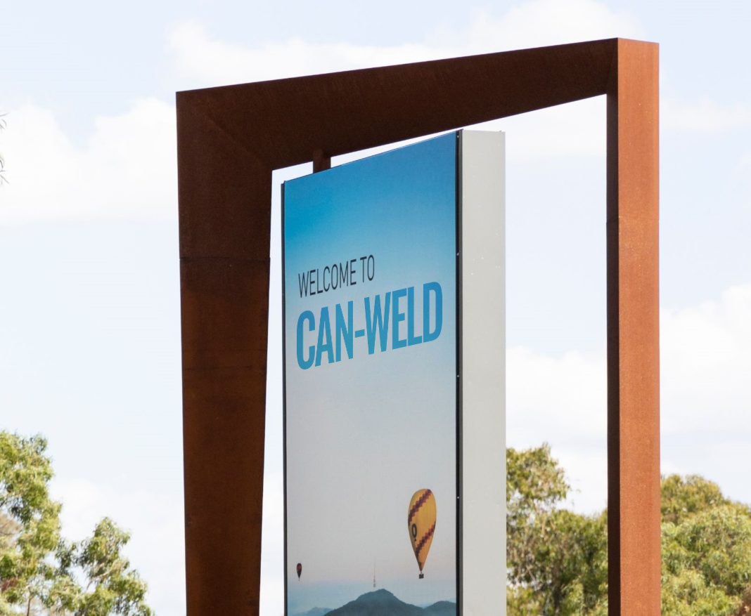 A sign that says 'Welcome to Can-Weld'.